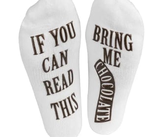 a pair of socks with the words, if you can't read this,