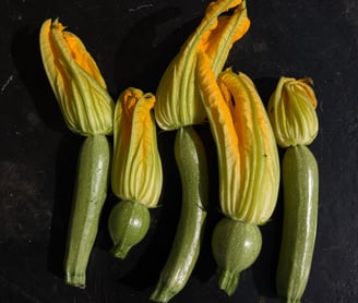 Mini courgettes with flowers attached