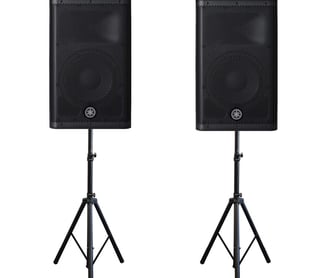 two PA speakers on stands