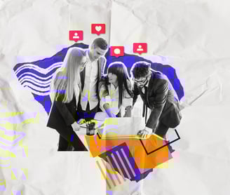 a group of people standing around a laptop