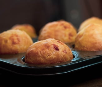 a tray of baked goods and pastries