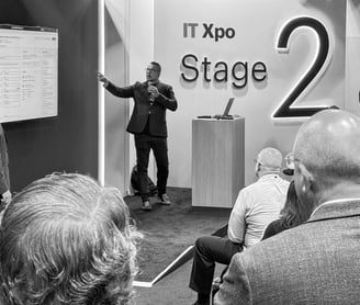 Chad on stage speaking at Gartner ITXpo
