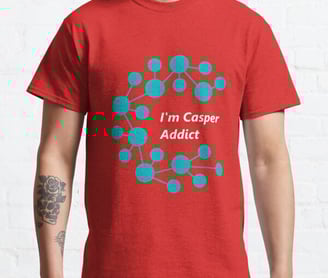a man wearing a red shirt with the words i'm casperer addict