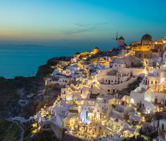 a view of a city at night time
