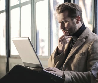 man using laptop