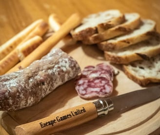 a wooden cutting board with bread and bread