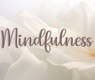 a white flower with the words mindfulness