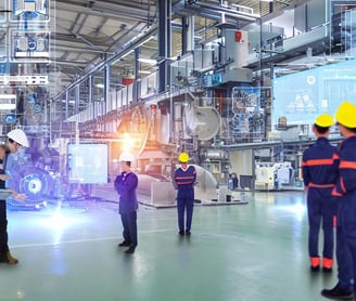 Engineers operating automation systems in a factory