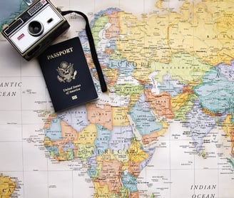 a map and camera on it with passport