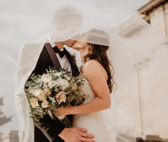 bride and groom kissing