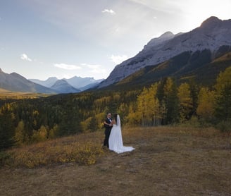 Couple getting wedding photos at Kananaskis village