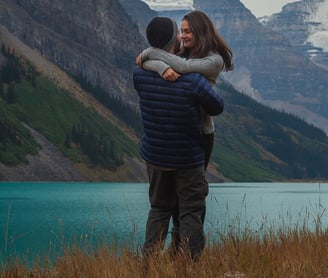 Couple getting engaged at Lake Louise