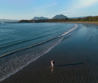 Tofino elopement photographer photographing a couple eloping on Chesterman beach