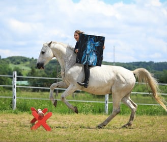 Kasia Bukowska jumping bareback and bridleless with her equine art horse painting