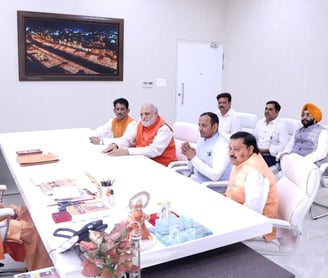 Natwar Goyal with Chief Minister of Uttar Pradesh Yogi Adityanath. Natwar Goyal Sitting infront of yogi Adityanath.