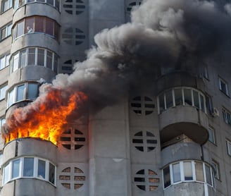 a fire is seen in a house on top of a building