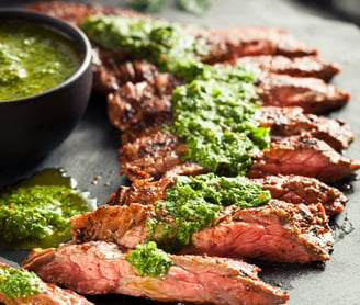 skirt steak sliced served with chimi churri