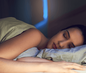 Woman sleeping soundly in bed
