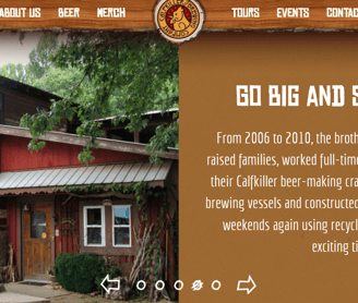 a website page with a picture of a barn