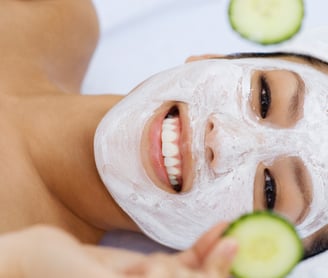 a woman with a face mask on her face