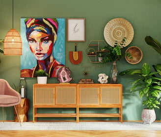 a living room with a painting of a woman's face