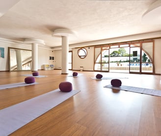 yoga room at hotel kalura in Sicily with mats ready for asana, meditation and pranayama