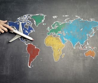 top world travel destinations - a plane flying over a chalkboard with a map of the world