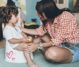 mother potty training child