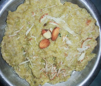 a bowl of food with nuts and almonds