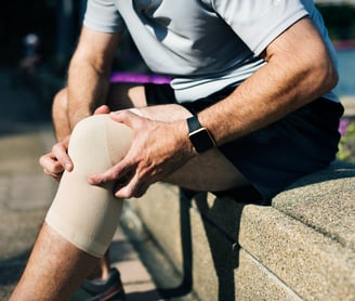 man showing location of knee injury