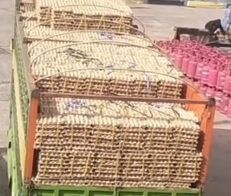 a truck with table egg on it