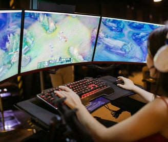 a woman playing a video game on a computer screen