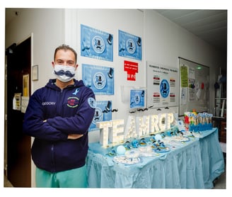 photography of a nurse in a mask with beautiful decoration on a table