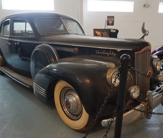 A 1941 Packard Custom Super Eight One-Eighty featured in the film The Godfather at the Vintage Grill & Car Museum in Weatherf