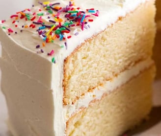 a slice of cake with a slice taken out of it