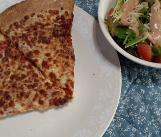 cheese pizza with salad and diet root beer