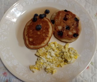 protein pancakes w blueberries and egg
