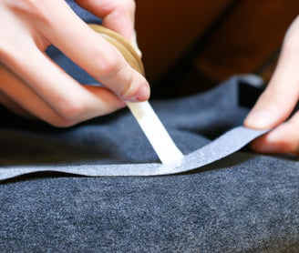 Gluing cloth with adhesive tape for clothes