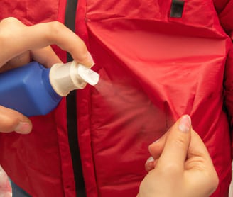 spray waterproofing on jackets and shoes