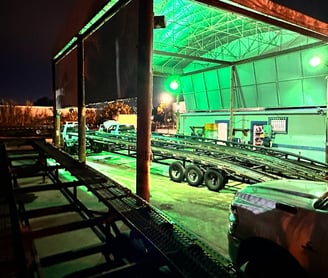 General view of Truck & Trailer Services repair station at night