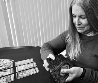 woman reading tarot cards
