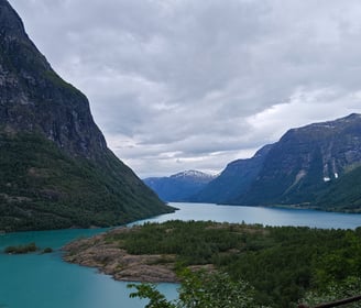 Blue river with mountains in Norway