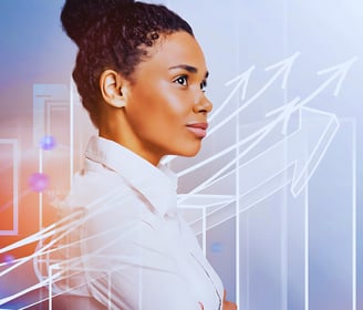 A female leader in a white shirt crosses her arms and looks up against a background of rising arrows symbolizing growth.