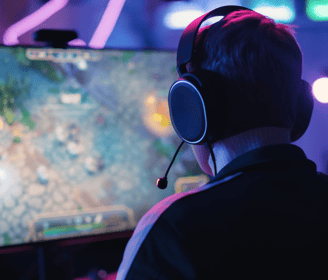 a man wearing headphones and headphones, playing a video game