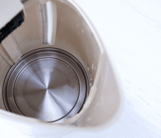 a blender with a metal bowl and a metal bowl