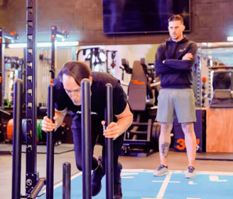 a man is a prowler on a blue mat