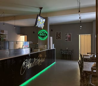 Interno della pizzeria AndrèsRosa ad Alseno, dove serviamo pizza artigianale cotta nel forno a legna