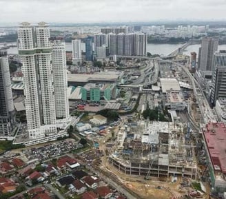 Alt: "Aerial view of Johor CIQ checkpoint and Bukit Chagar RTS station construction" Alt: "Skyline o