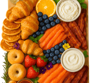 a platter of food with fruit and vegetables