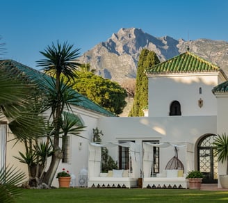 Garden view of Villa El Rincon with the iconic La Concha mountain as a stunning backdrop.